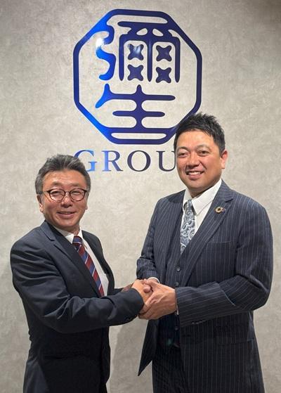 事業提携を結んだ北海道彌生HDの山田健蔵社長（右）とループライズの秋田聡代表