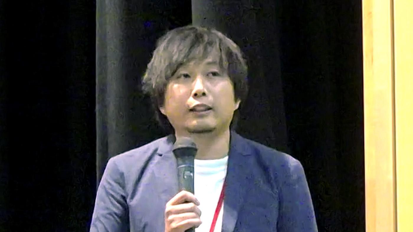 交流会で講演する北広牧場の若杉真吾専務
